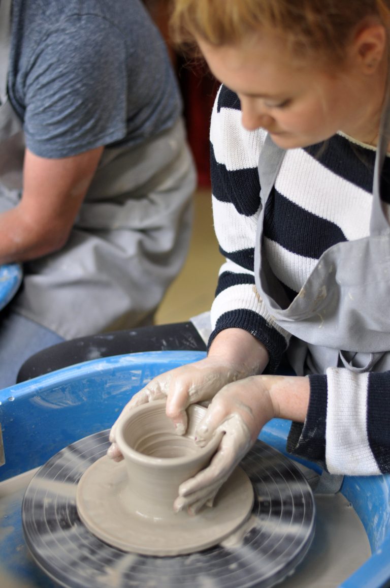 Throwing on the Fitzwilliam wheels at Ashbrook Ceramics.